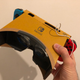 Nintendo Switch VR requires the Nintendo Labo VR goggles. While the goggles are mostly cardboard and therefore very light, the set-up necessitates that a user holds the system to their face. There is no headstrap, and the act of manipulating game controls inches from your face can be awkward. It is awkward for the Mario and Zelda VR modes.